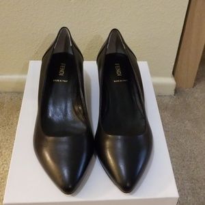 Black leather low pointed wedges